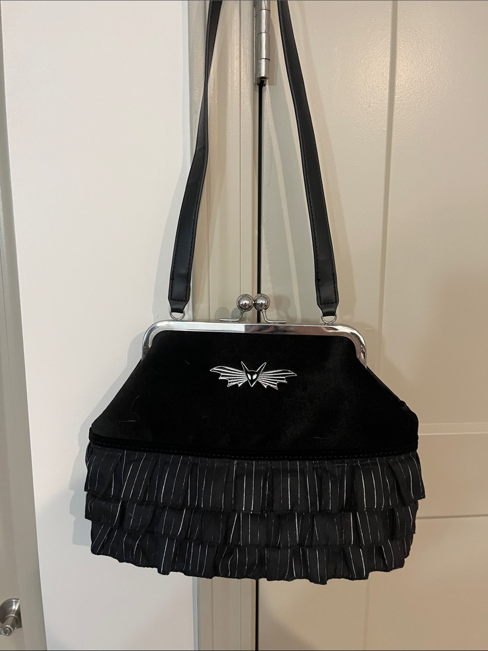 Disney Black Ruffled Clutch with Silver Bat Emblem